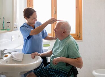 Caretaker-brushing-hair-scaled-1
